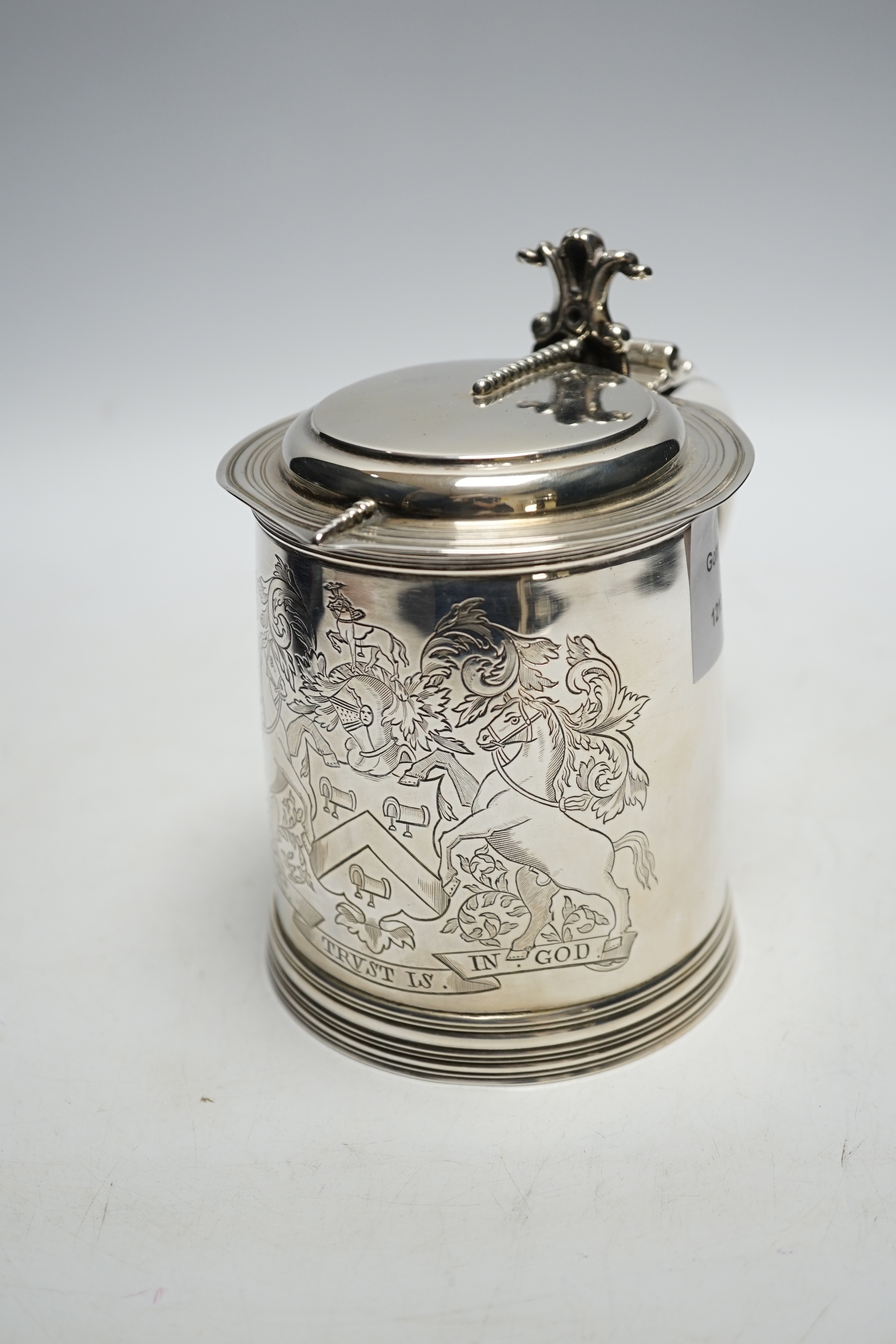 A late Victorian silver tankard, with engraved crest and the motto 'Our Trust is in God', William & John Barnard, London, 1894, 14.4cm, 17oz.